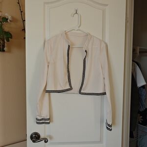 Elegant Cream Women's Jacket with Black Trim